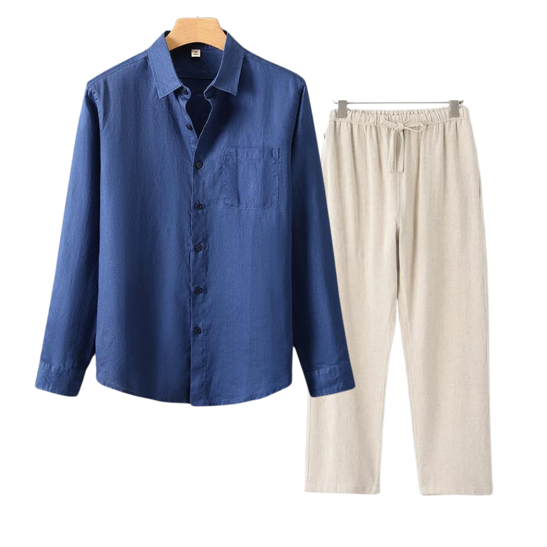 Blue shirt and beige pants on hangers against a white background